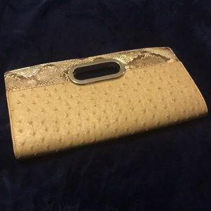 Ostrich like tan snake skin clutch